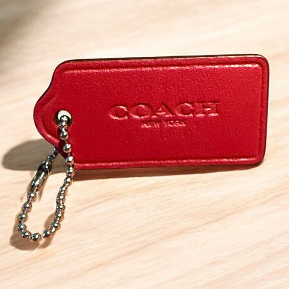Coach NY Medium Key Fob in Dark Reddish Pink - Picture 1 of 4
